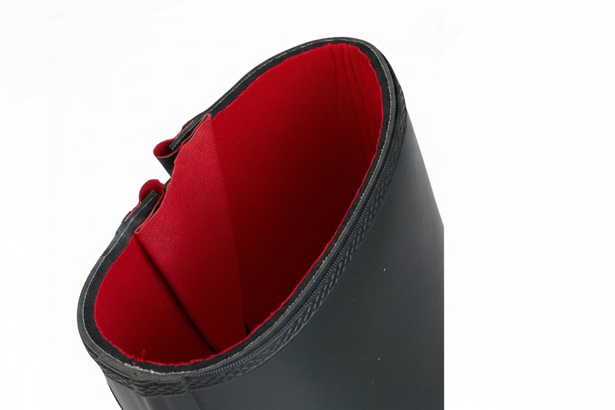 Black boot with red interior on a white background UK Size 14