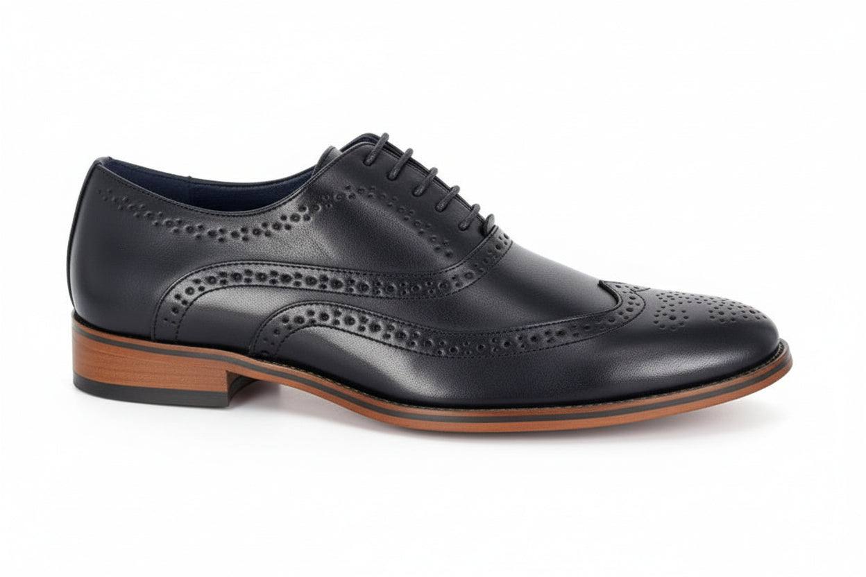 Black leather dress shoe with brown sole on a white background UK Size 14