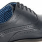 Close-up of a black leather shoe with blue lining on a white background UK Size 14