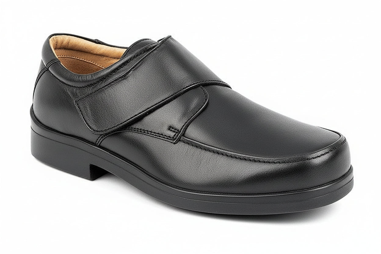 Black leather shoe with a strap on a white background XXX Wide Extra Wide UK Size 15