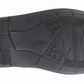 Black shoe sole with tread pattern on a white background