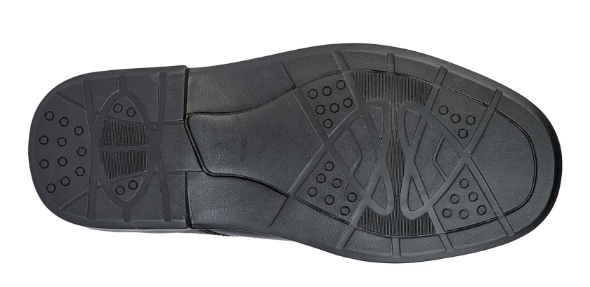 Black shoe sole with tread pattern on a white background UK Size 14