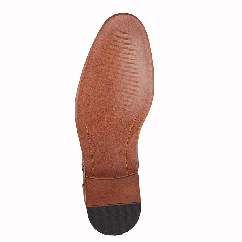 Close-up of a brown leather shoe sole on a white background UK Size 14