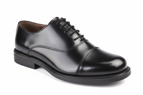 Black leather dress shoe on a white background UK Size 14