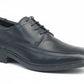 Black leather dress shoe on a white background UK Size 14