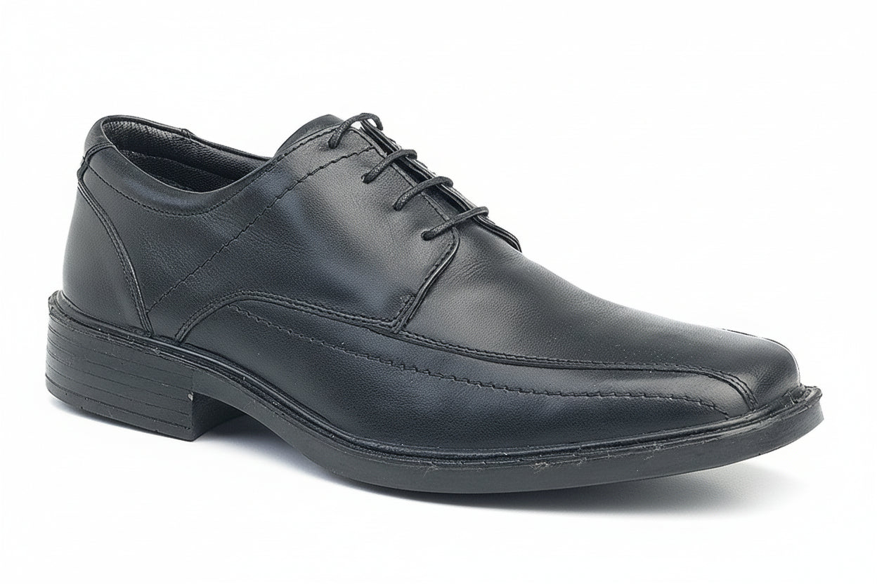 Black leather dress shoe on a white background UK Size 14