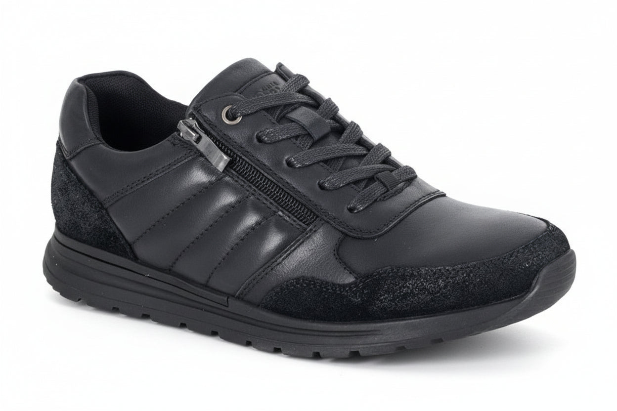 Black leather sneaker on a white background