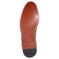 Close-up of a shoe sole with brown leather and black rubber sole on a white background UK Size 14