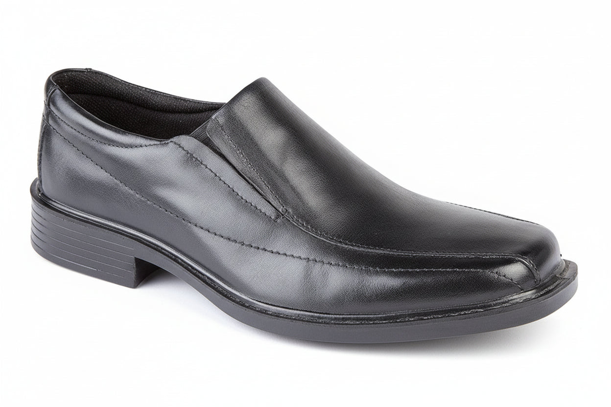 Black slip-on shoe on a white background UK Size 14