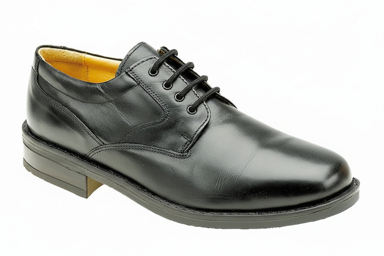Black leather dress shoe on a white background UK Size 14