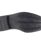Black shoe sole with tread pattern on a white background UK Size 14