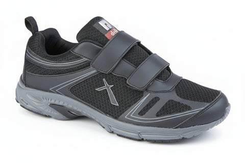 Gray athletic shoe with velcro straps on a white background