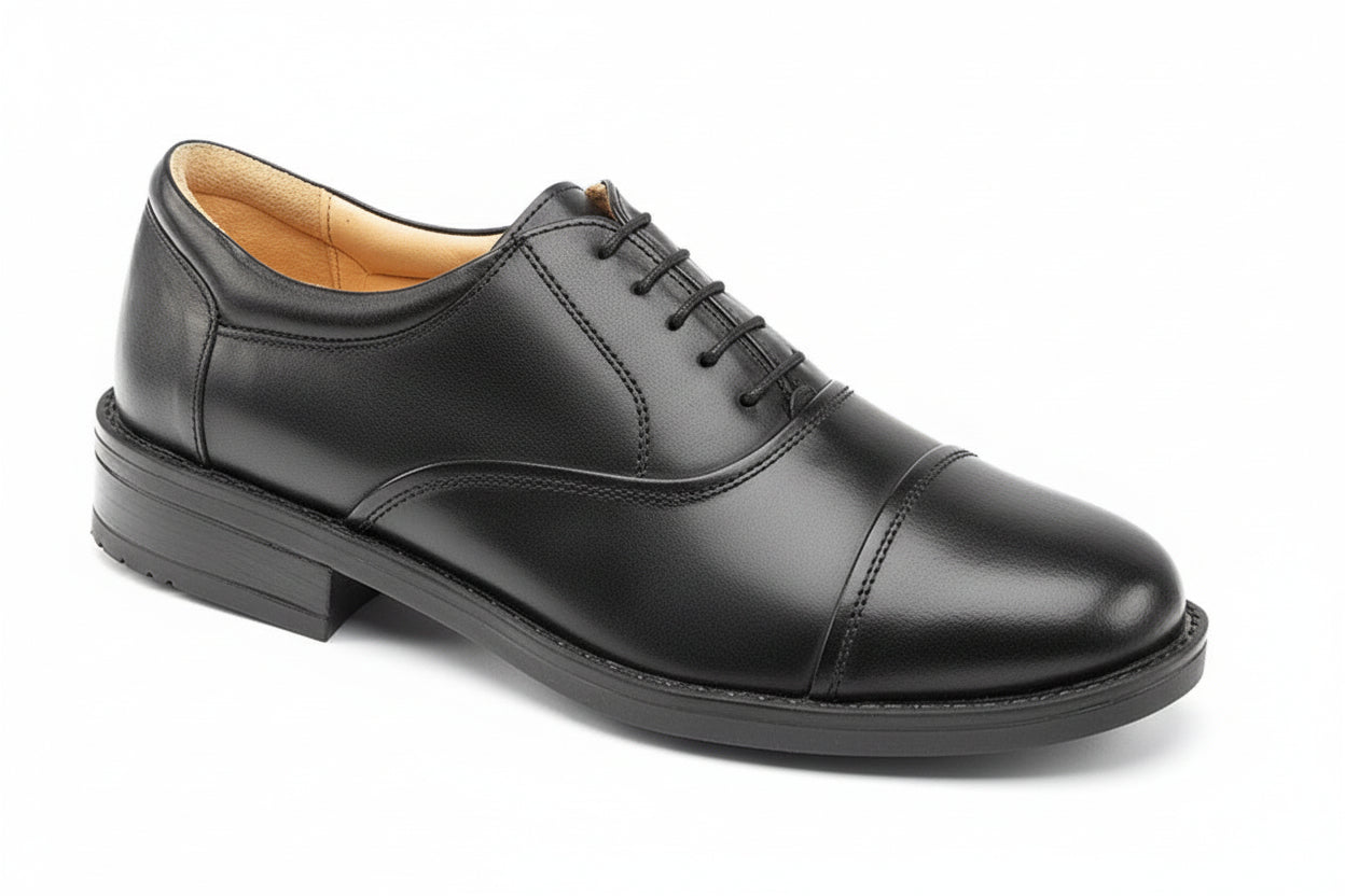 Black leather dress shoe on a white background UK Size 14