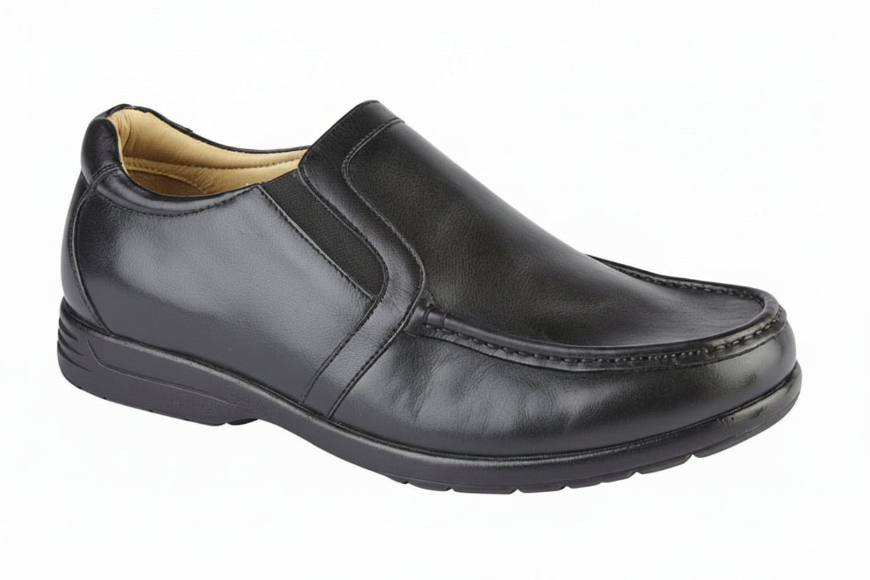Black slip-on shoe on a white background UK Size 15 Extra Wide