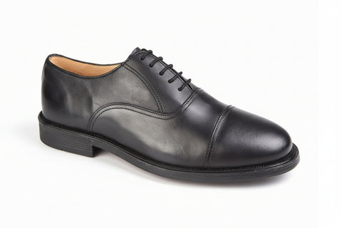 Black leather dress shoe on a white background UK Size 14