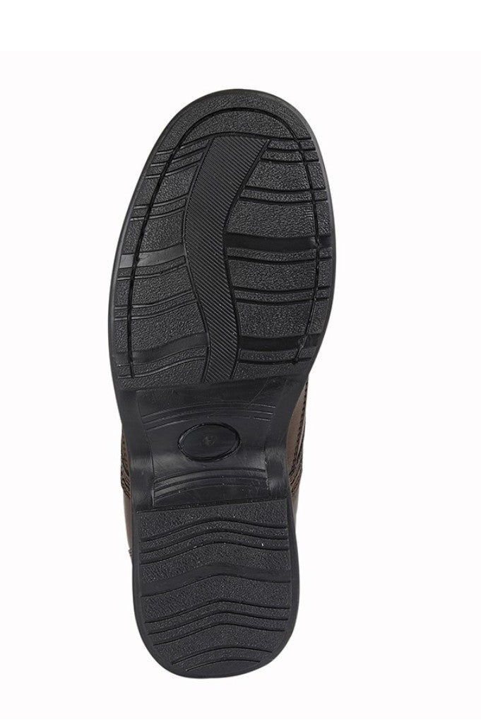 Black rubber sole of a shoe on a white background UK Size 14